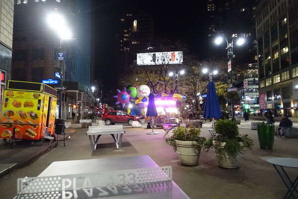 Herald Square pedestrian plaza at night